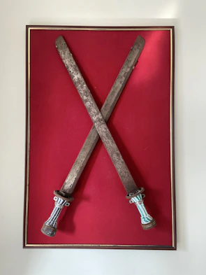 Artistic interpretation of the Four of Swords with soft, calming colors and intricate sword designs.