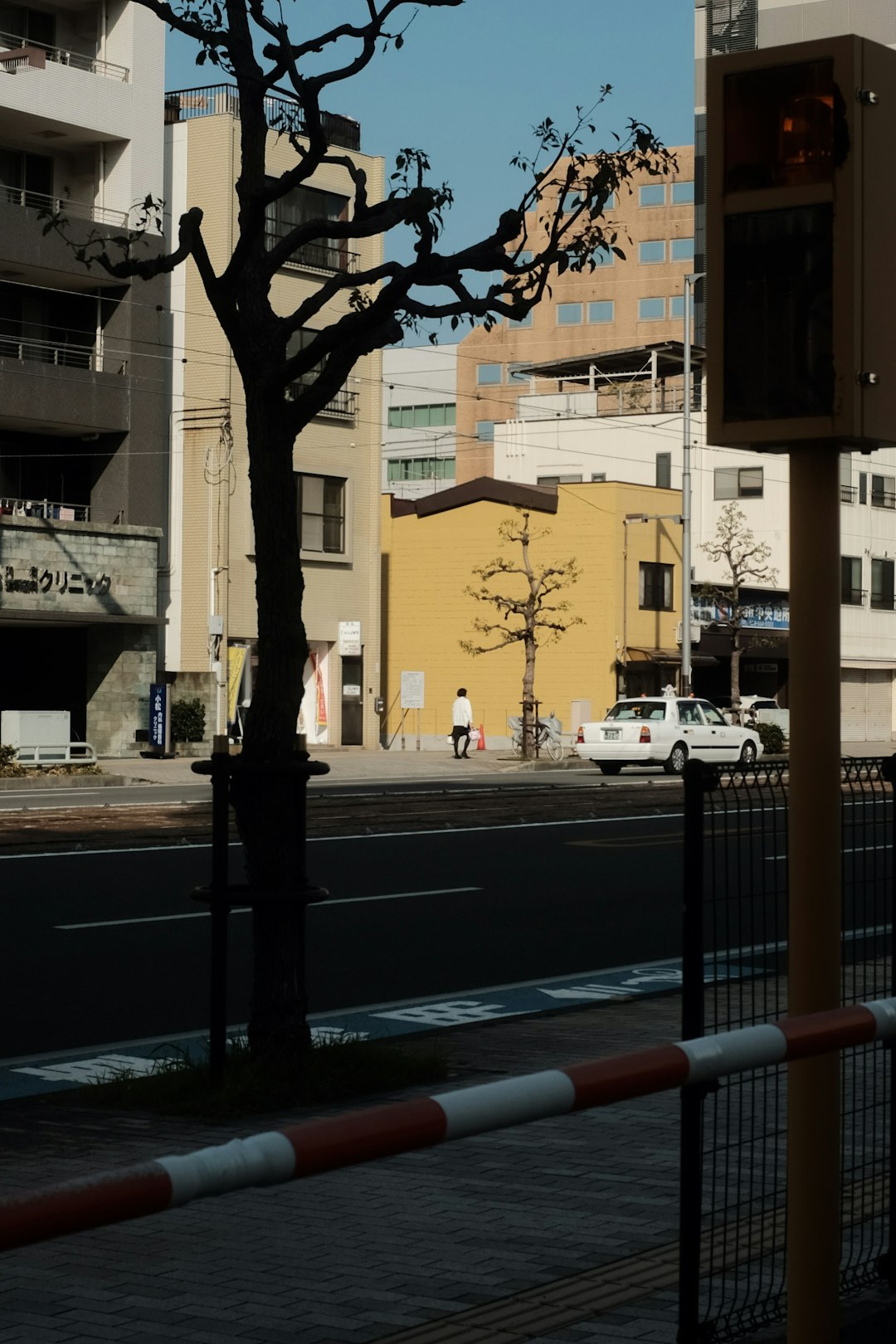 cars parked on side of the road during daytime