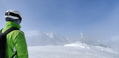 snow covered mountain under blue sky during daytime