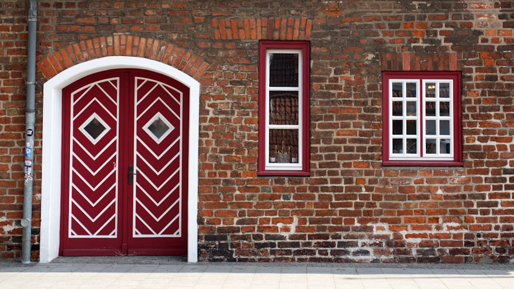 red brick building with white wooden window