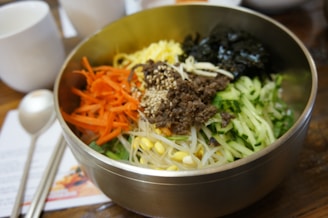 A bowl filled with sliced dried sea cucumber pieces ready for cooking.