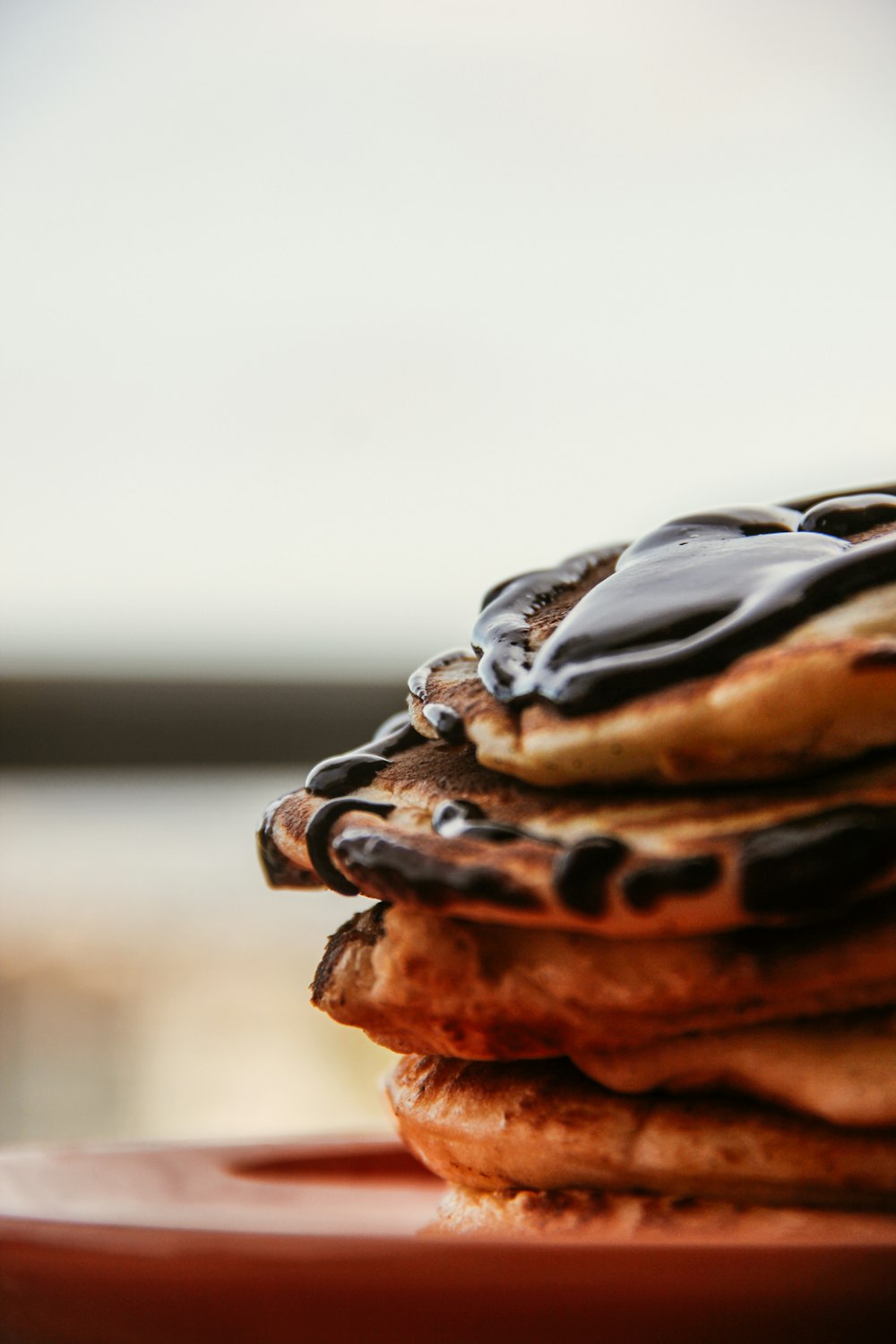 chocolate cupcake with chocolate and cream on top