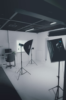 black and gray music stand with black and white microphone