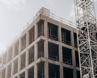 brown concrete building under white sky during daytime