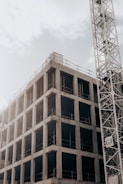 brown concrete building under white sky during daytime