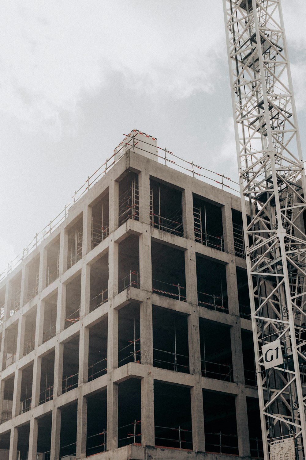 brown concrete building under white sky during daytime