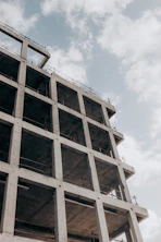 brown concrete building under blue sky during daytime