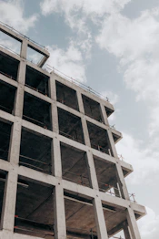brown concrete building under blue sky during daytime