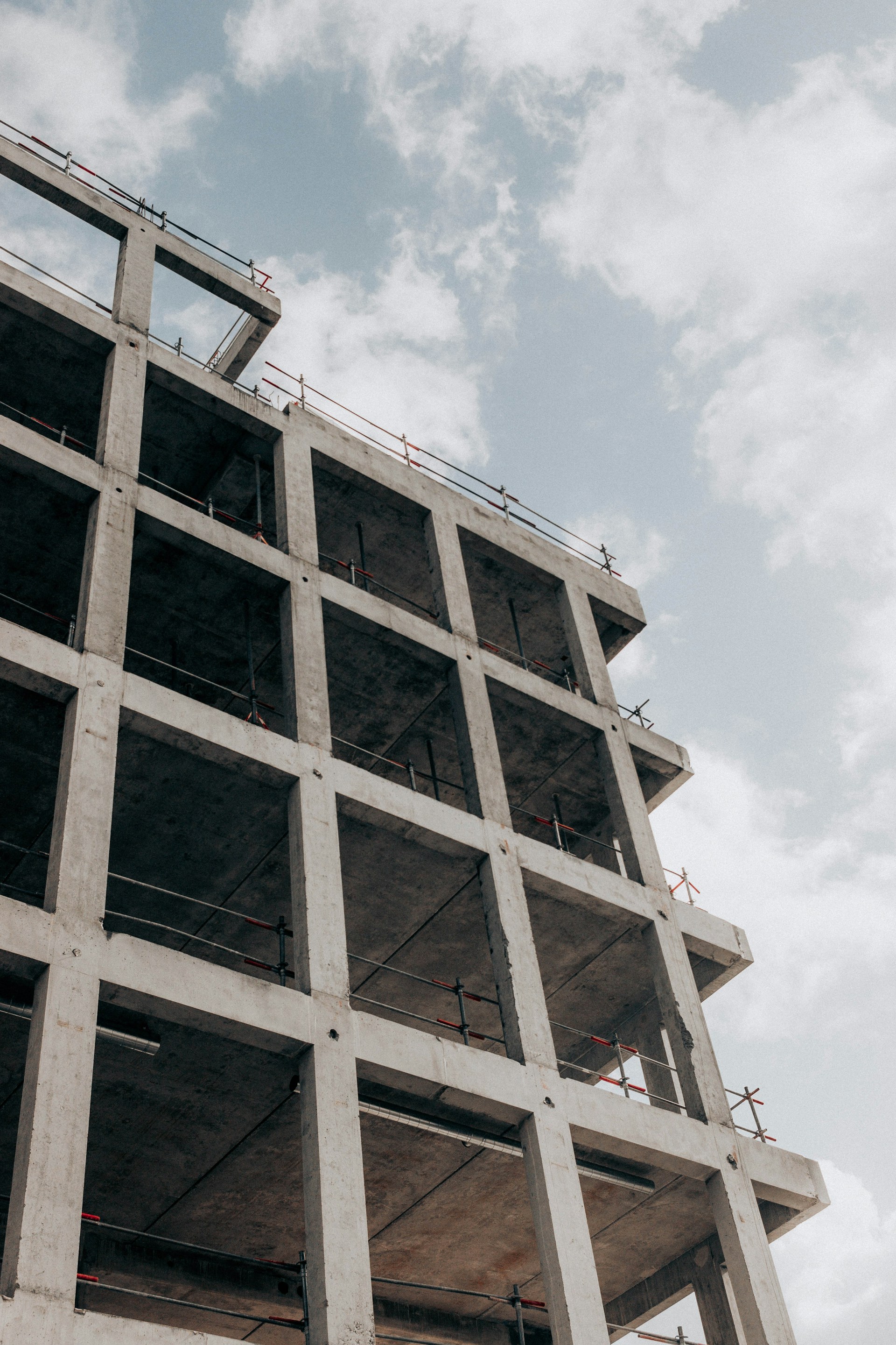 brown concrete building under blue sky during daytime