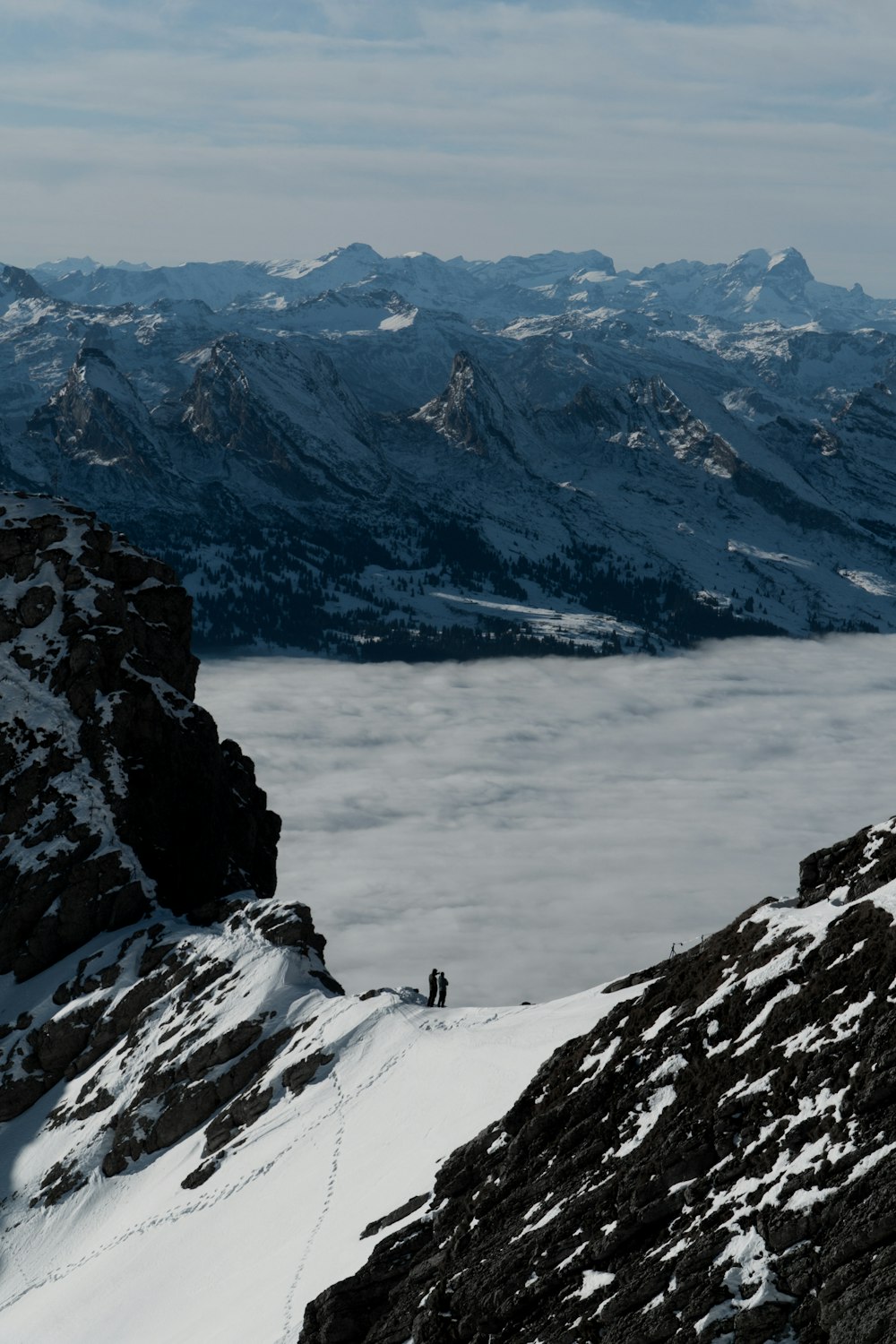 snow covered mountain during daytime