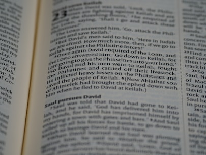 Close-up of a script page showing formatted dialogue and scene headings.