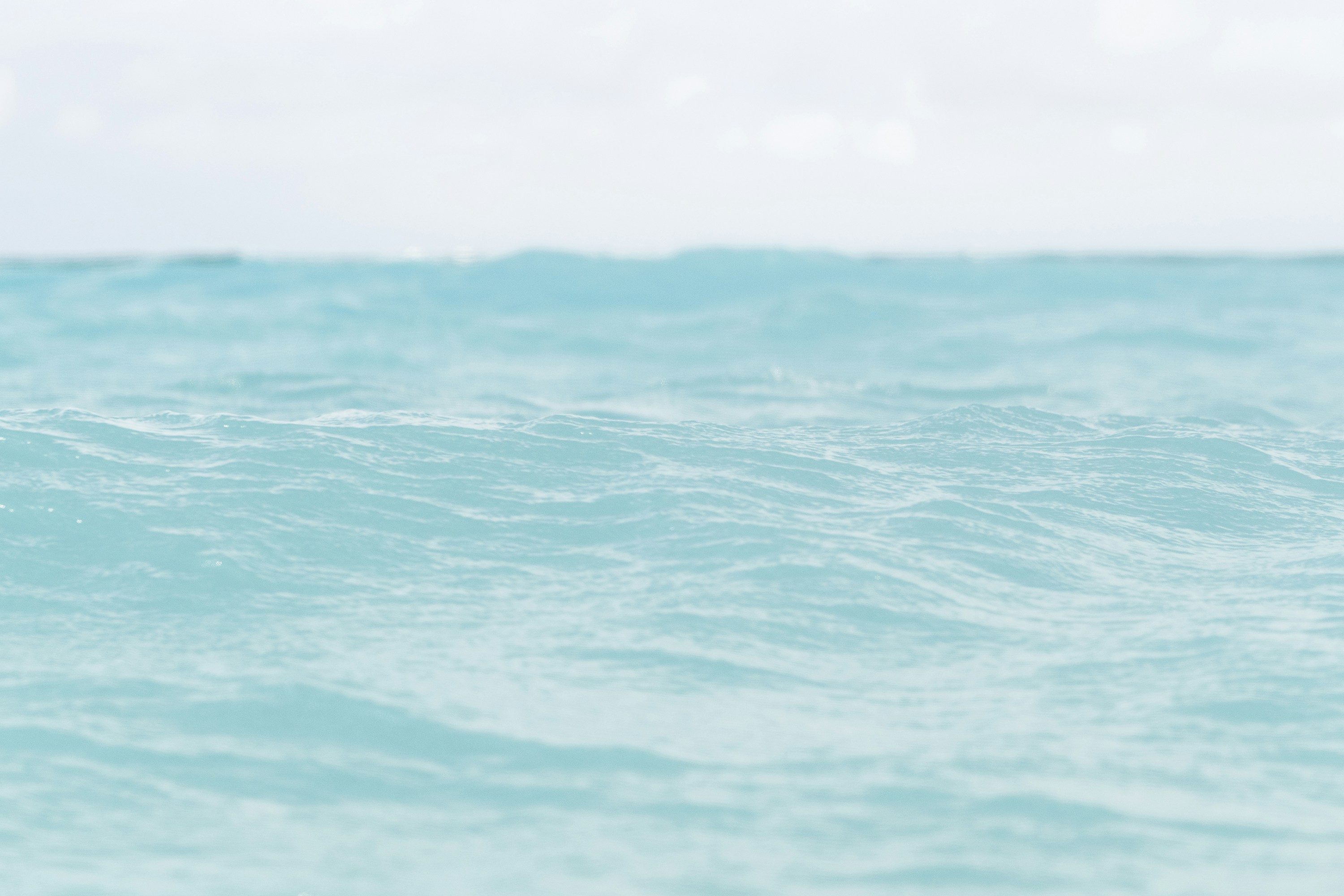 blue body of water during daytime, 