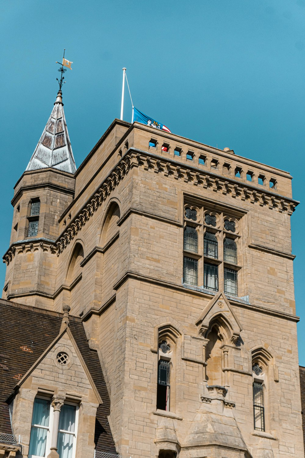 brown concrete building under blue sky during daytime