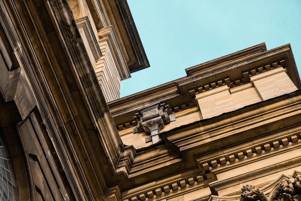 low angle photography of brown concrete building