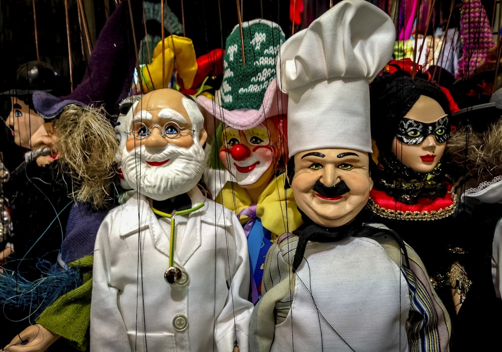 person wearing white and red clown costume