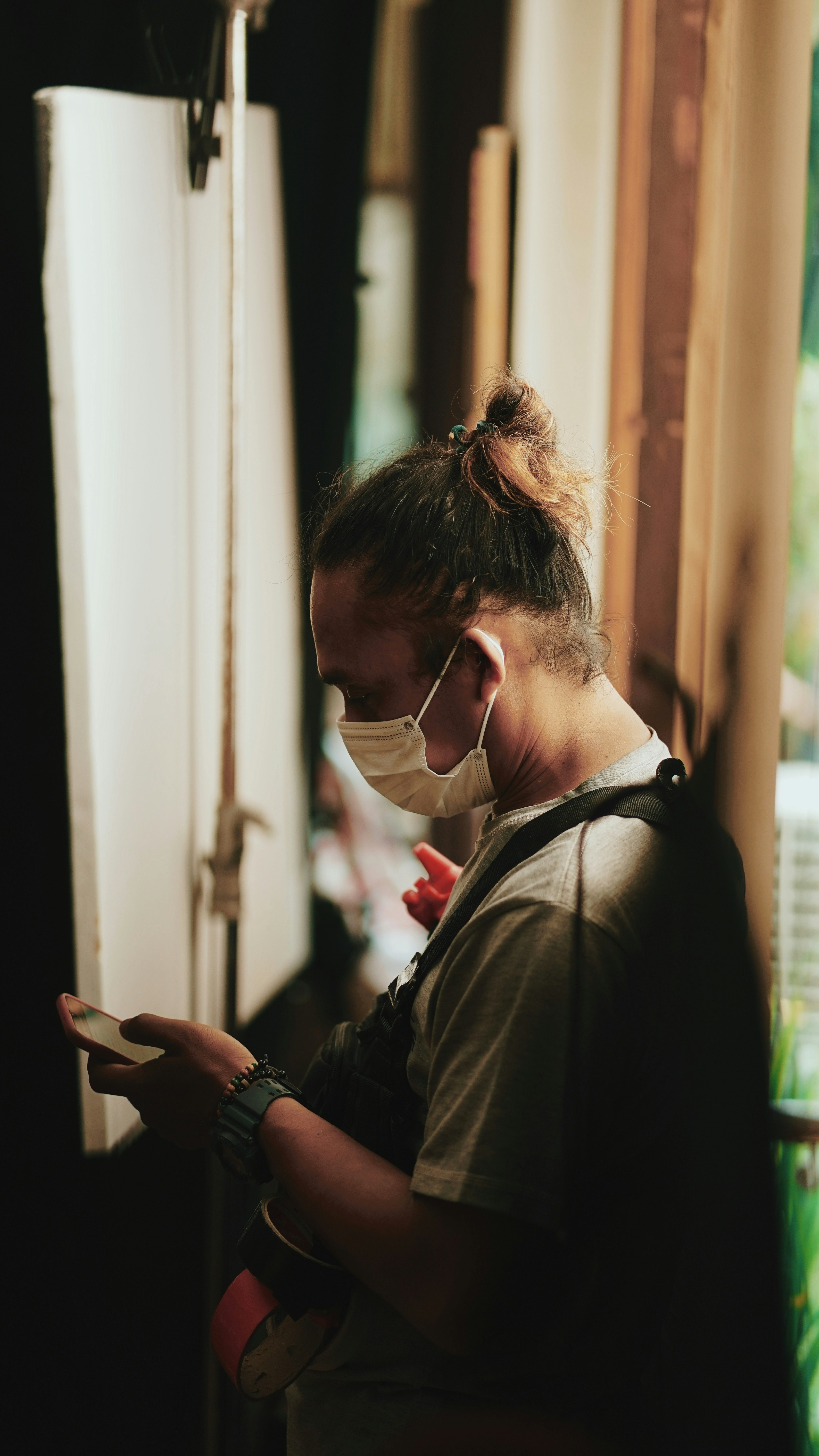 woman in black jacket wearing black framed eyeglasses