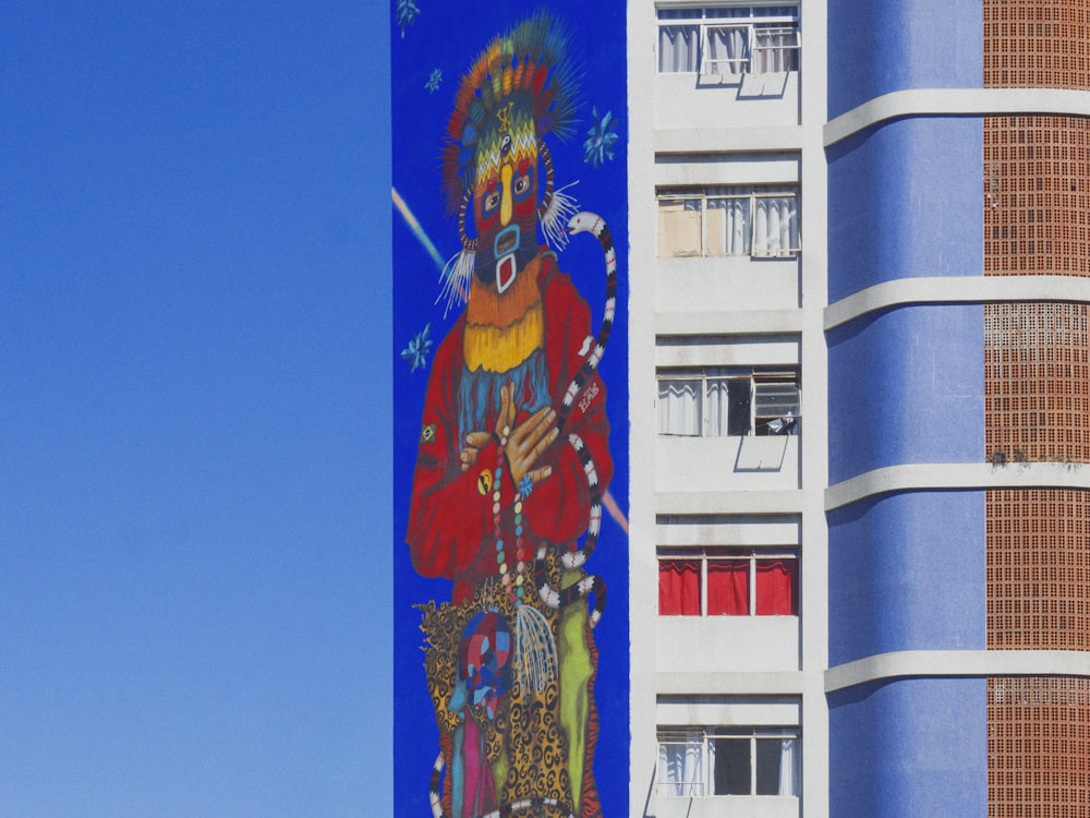 white red and blue concrete building under blue sky during daytime