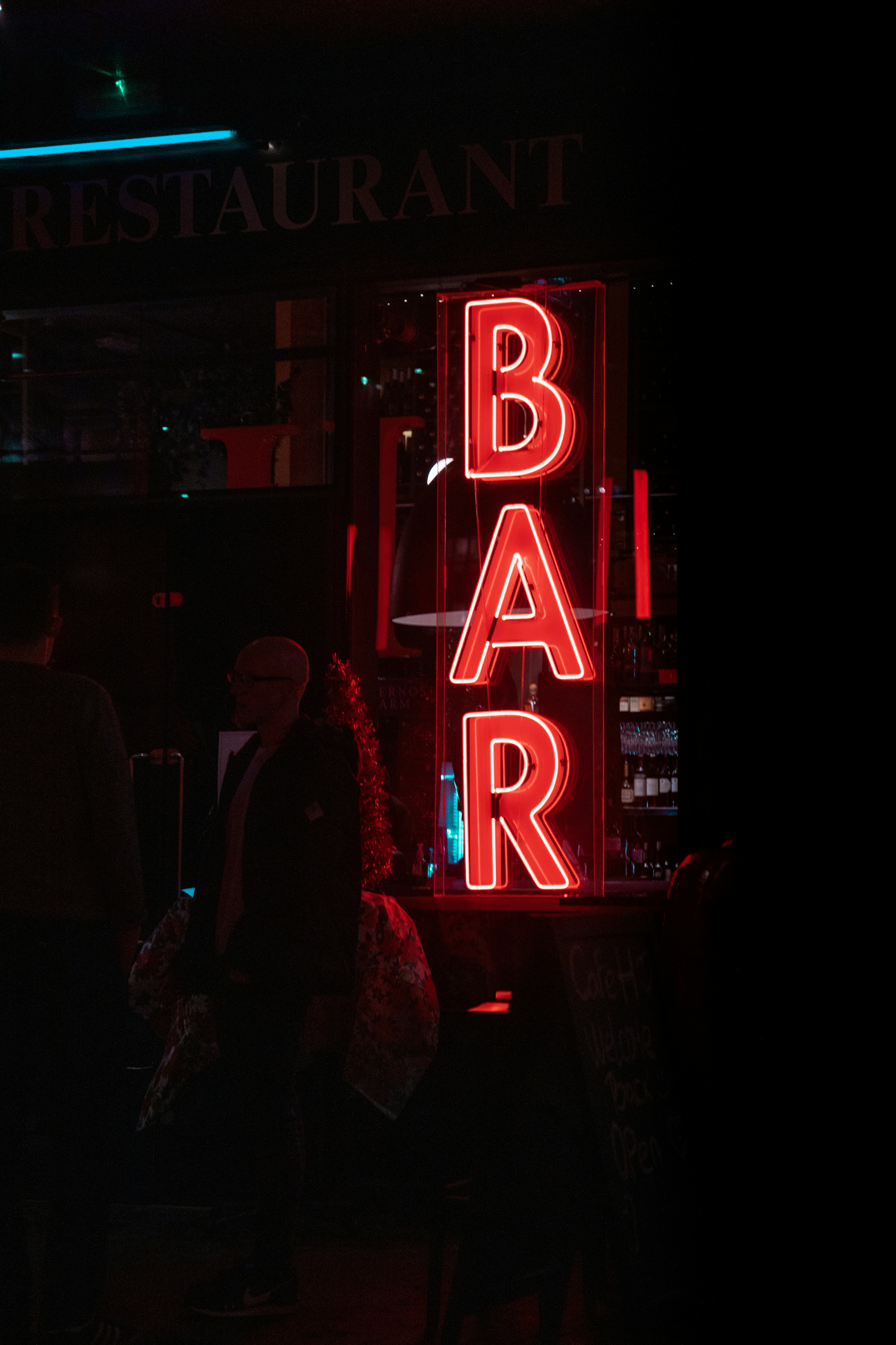 red and white UNKs neon light signage