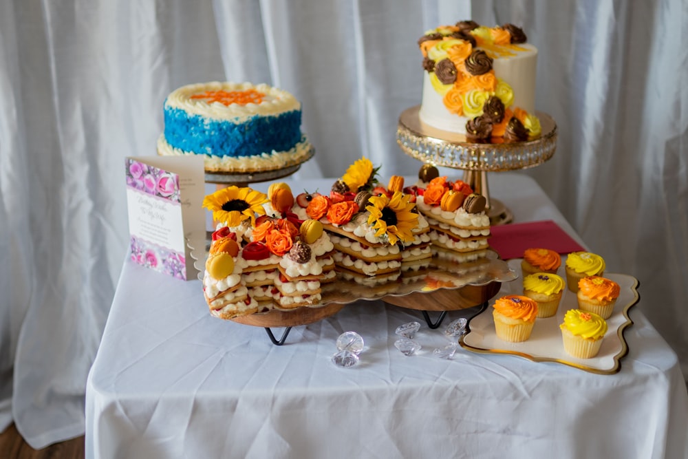 brown and white cake on white table cloth