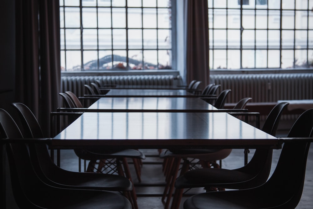 brown wooden table with chairs