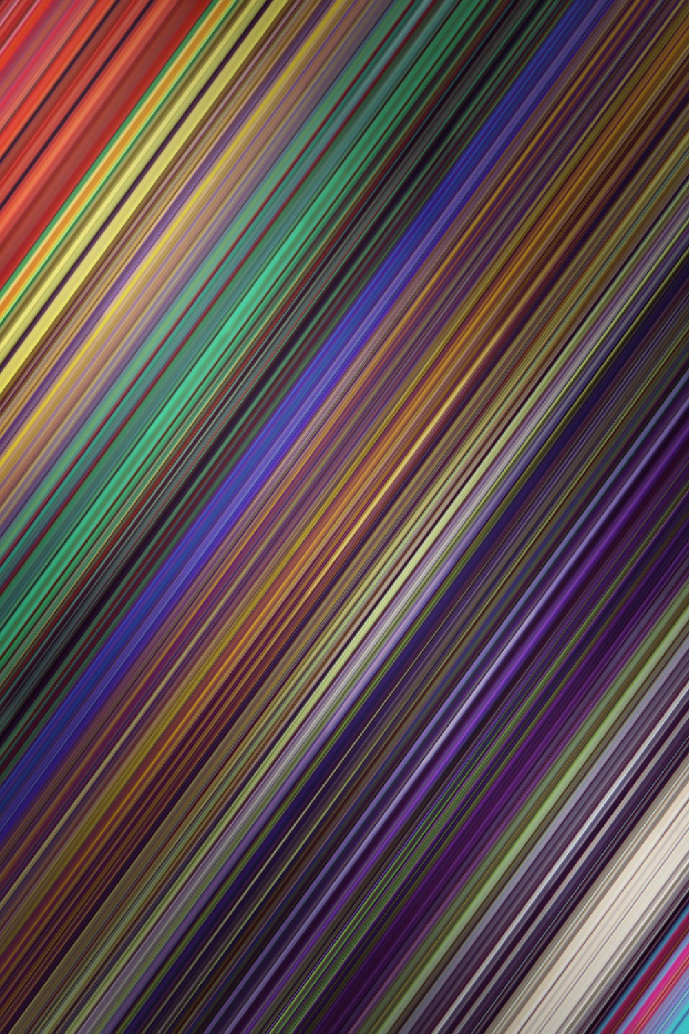 green purple and black striped textile