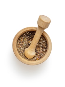 brown wooden mortar and pestle