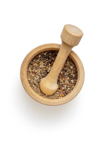 brown wooden mortar and pestle