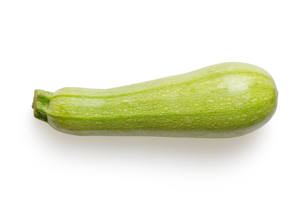 green vegetable on white surface