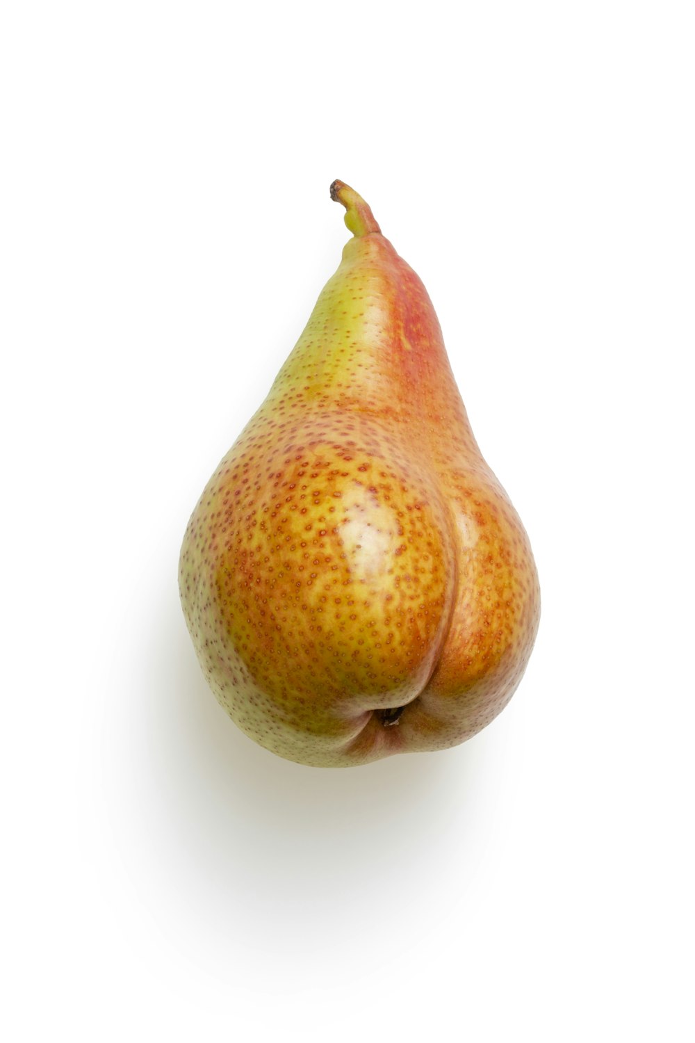 brown and yellow fruit on white surface