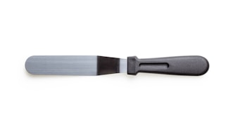 A metal spatula with a long, flat blade and a black plastic handle. The blade is slightly flexible, with a smooth, matte finish. The handle has an ergonomic design with a groove for grip.