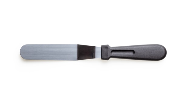 A metal spatula with a long, flat blade and a black plastic handle. The blade is slightly flexible, with a smooth, matte finish. The handle has an ergonomic design with a groove for grip.