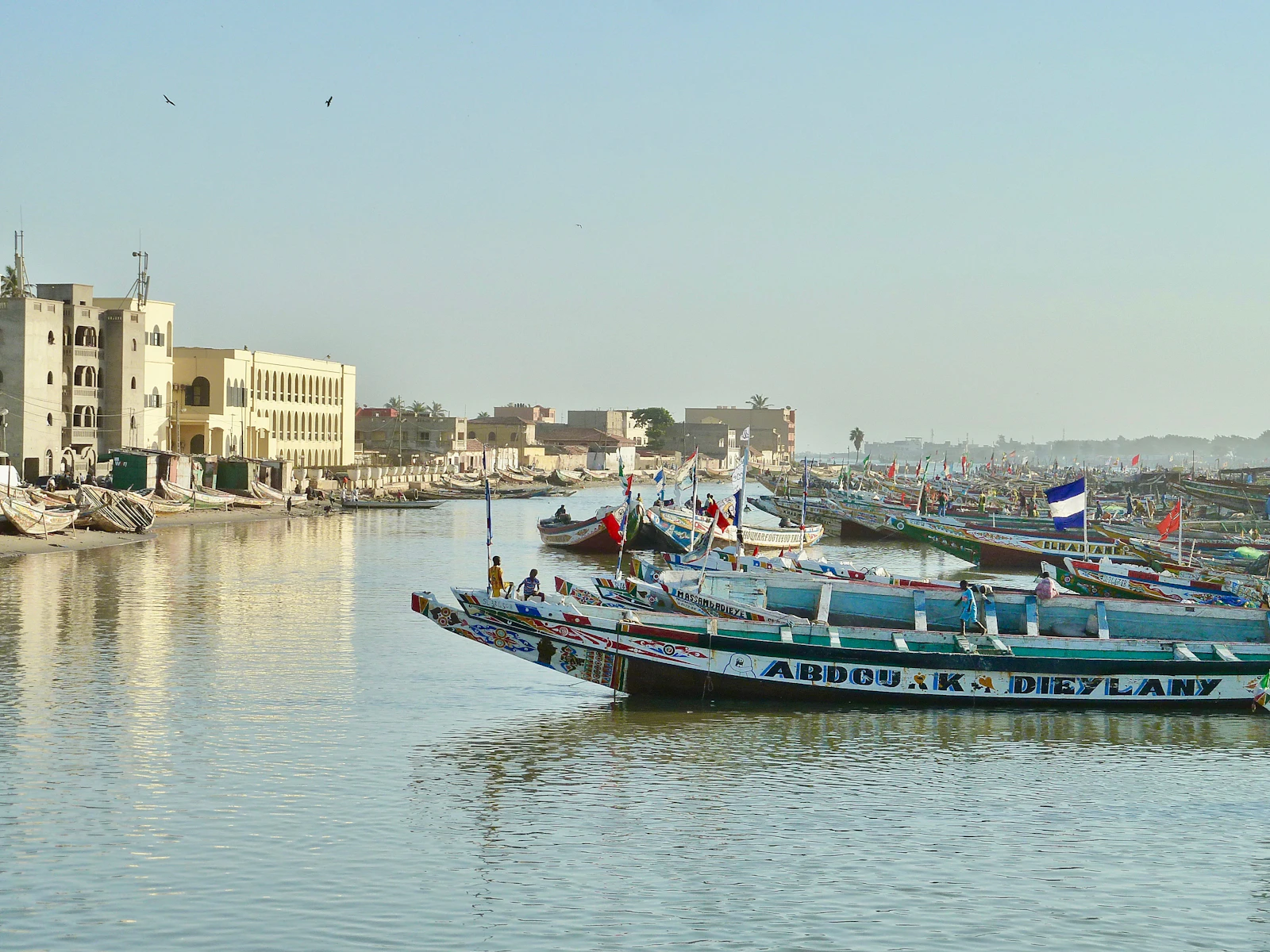 Painted pirogues on the river below the island — Saint-Louis, Senegal