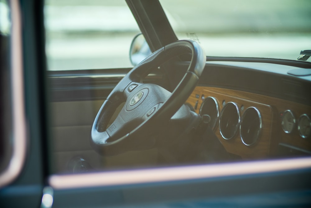 black and silver car steering wheel