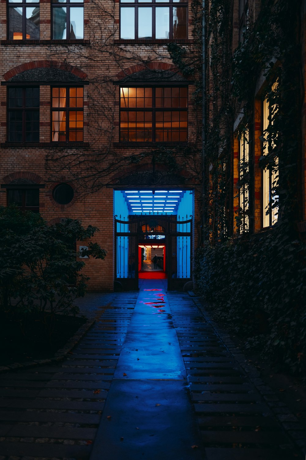 brown brick building with blue door