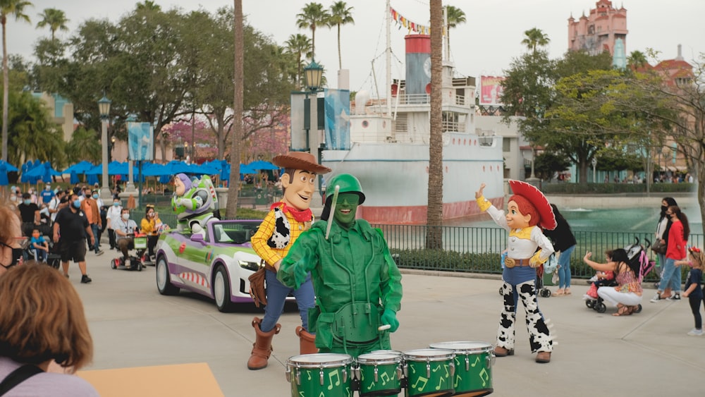 man in green jacket standing beside man in green jacket