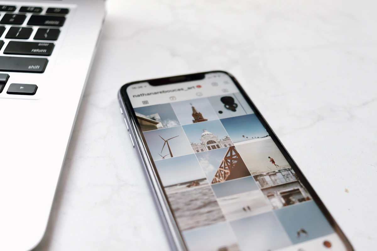 Smartphone showing a clean website on a white desk