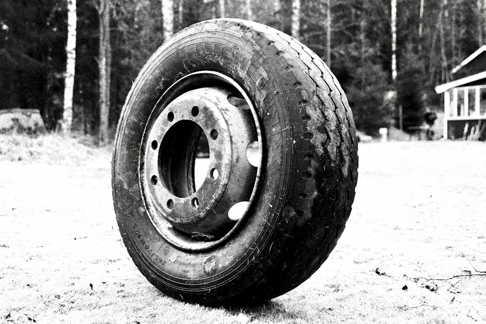 black wheel tire on gray concrete ground