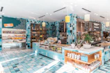 Bright store layout featuring vivid ceramics and cozy corners for mindful snacking.