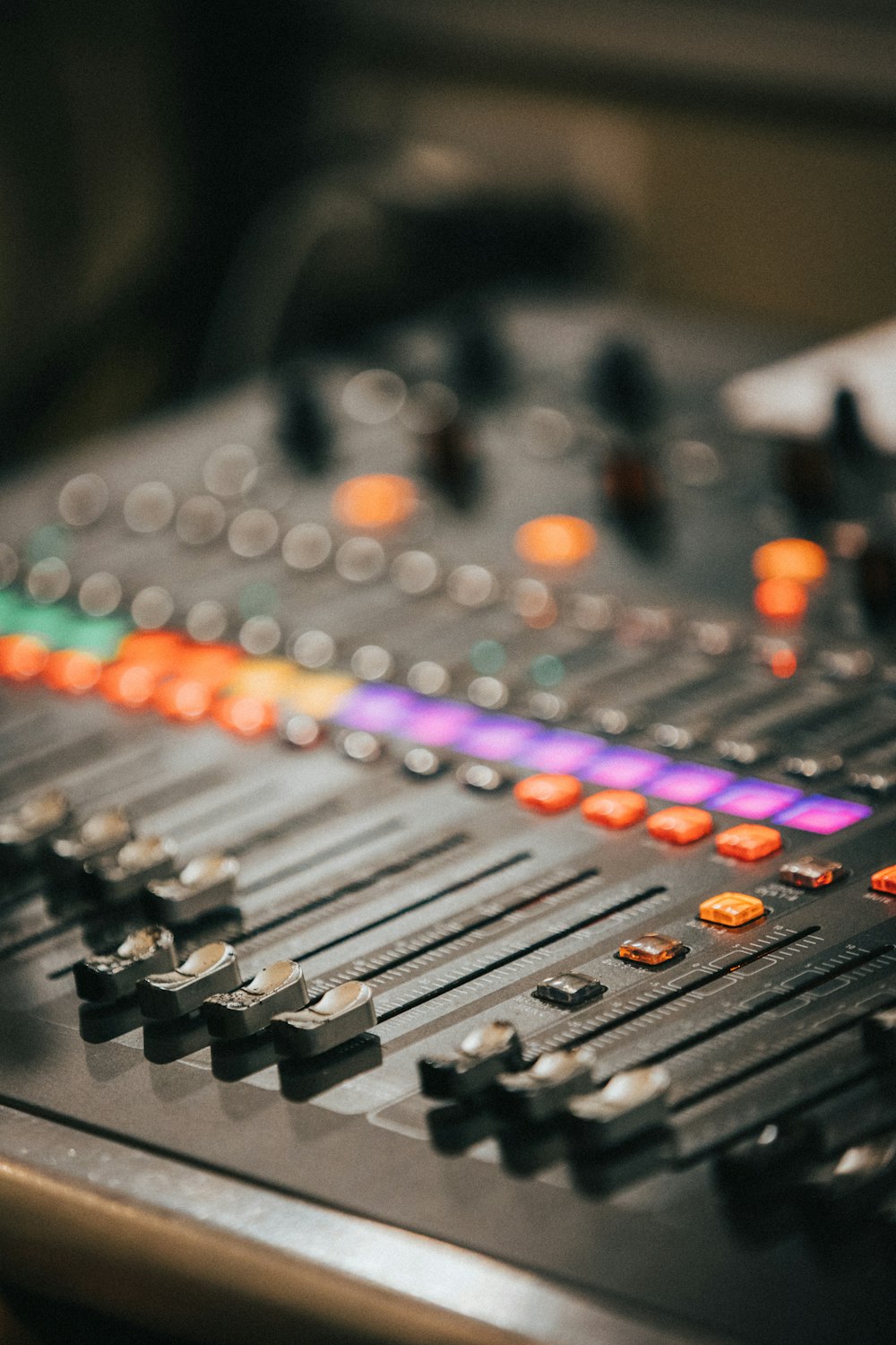 black audio mixer with multi colored lights