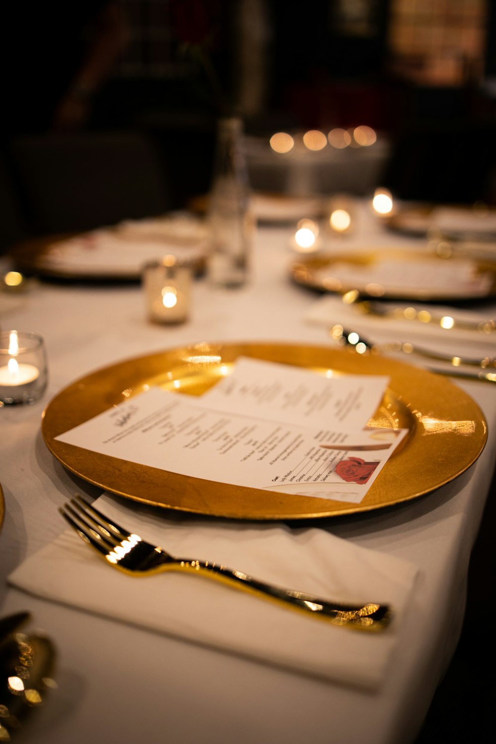 stainless steel fork and knife on white ceramic plate