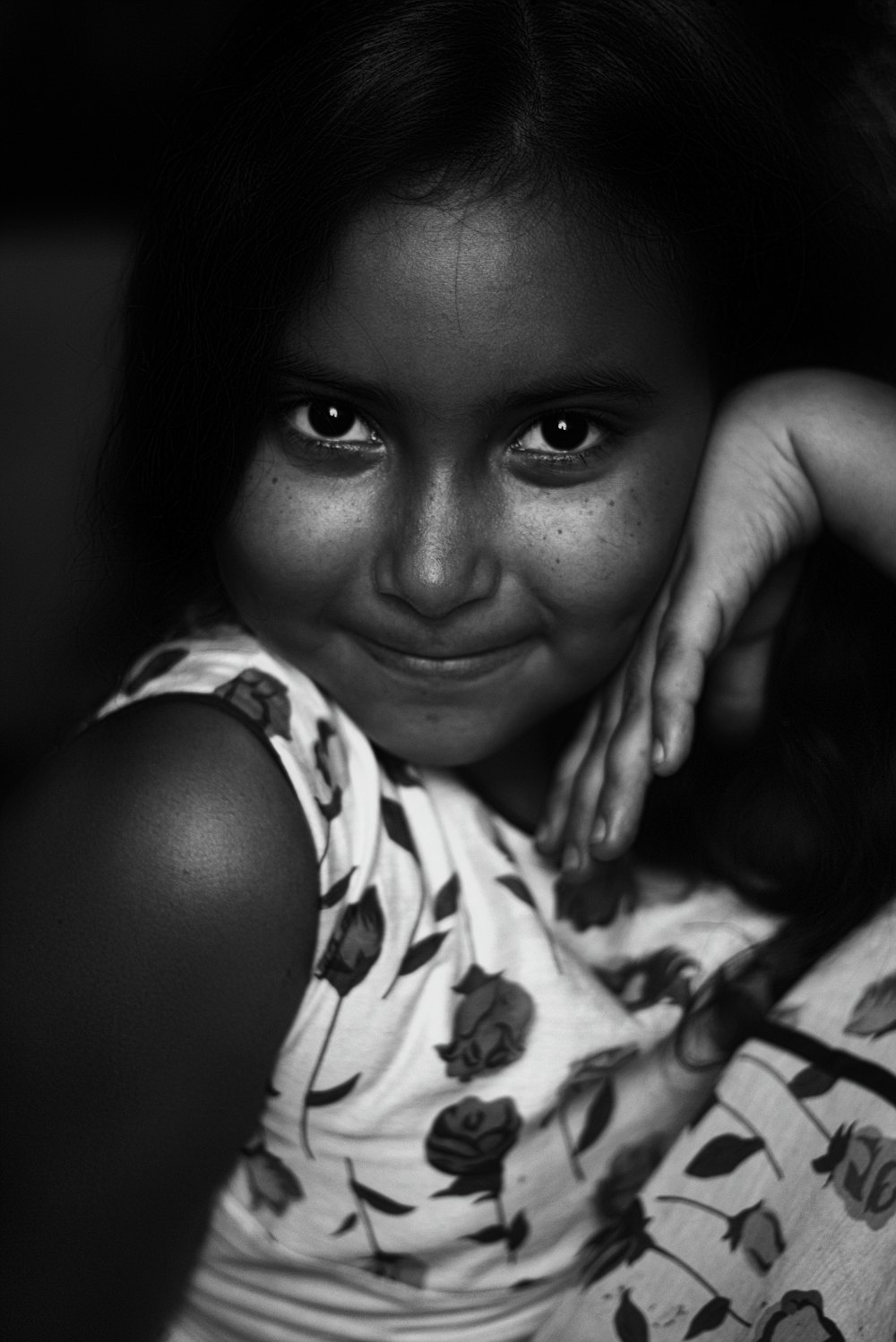 grayscale photo of girl in floral tank top