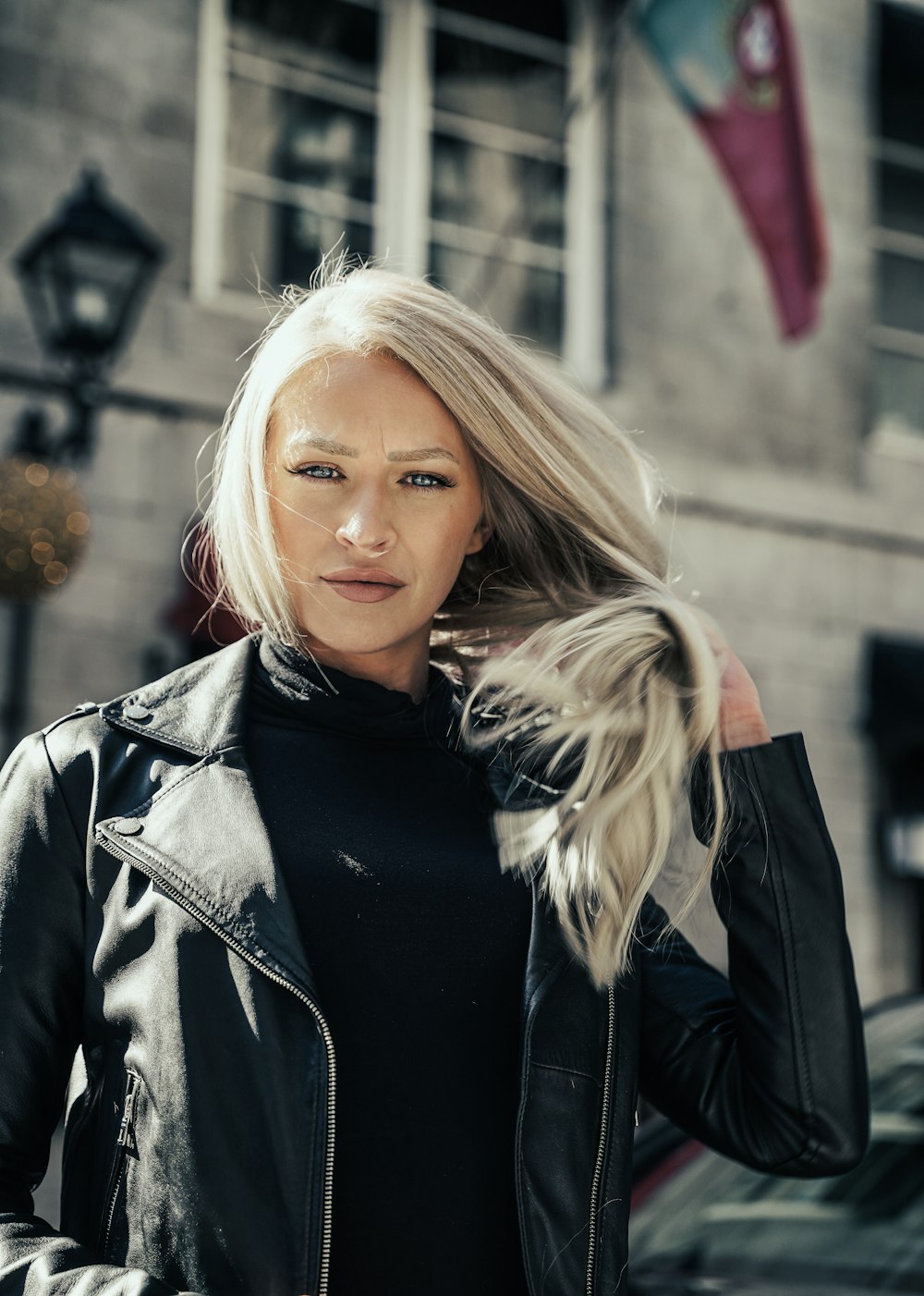 woman in black leather jacket