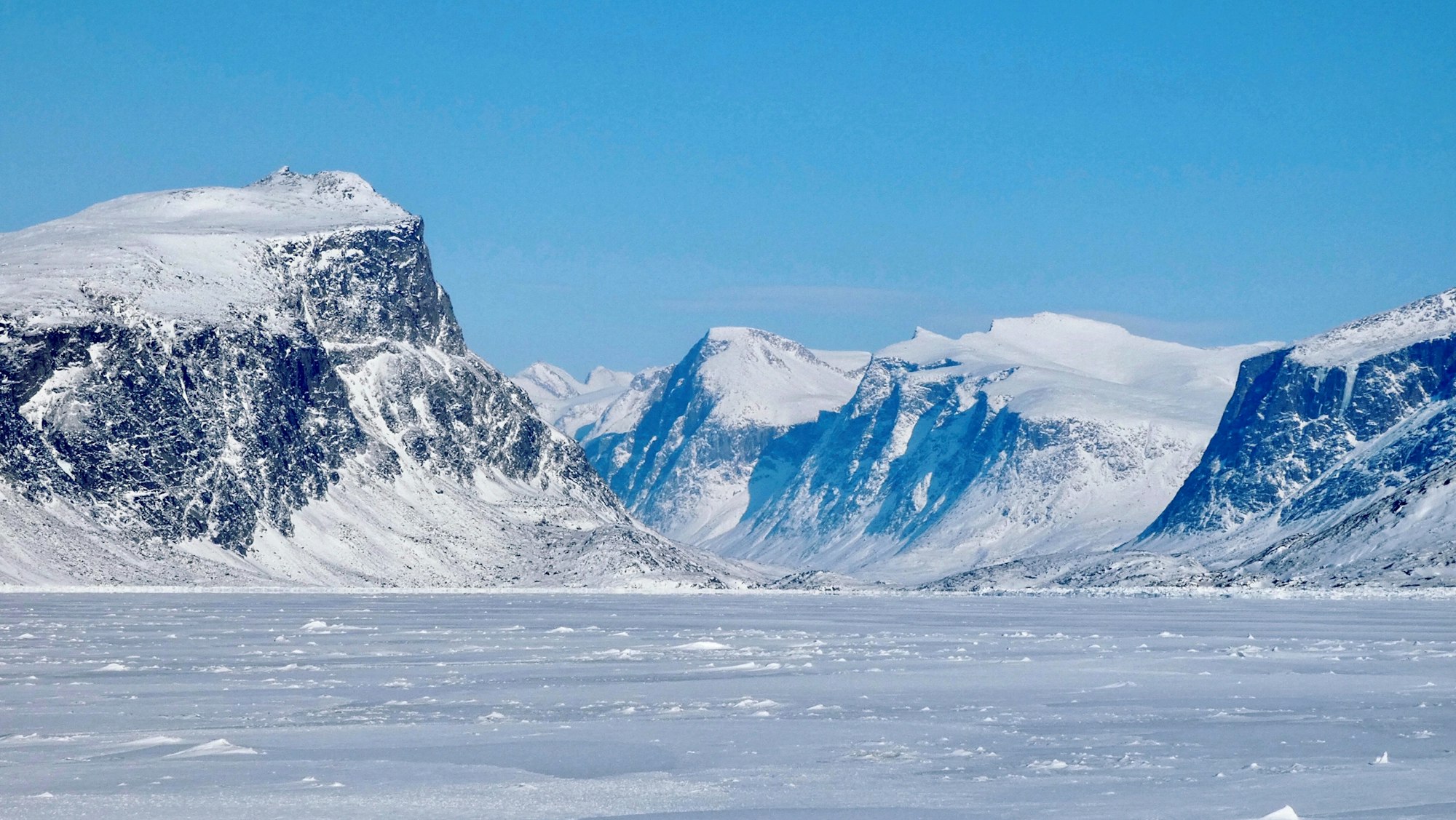 snow covered mountain under blue sky during daytime