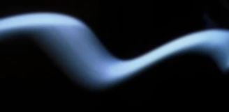 An abstract lavender and light blue shape floating gracefully against a clean white backdrop.