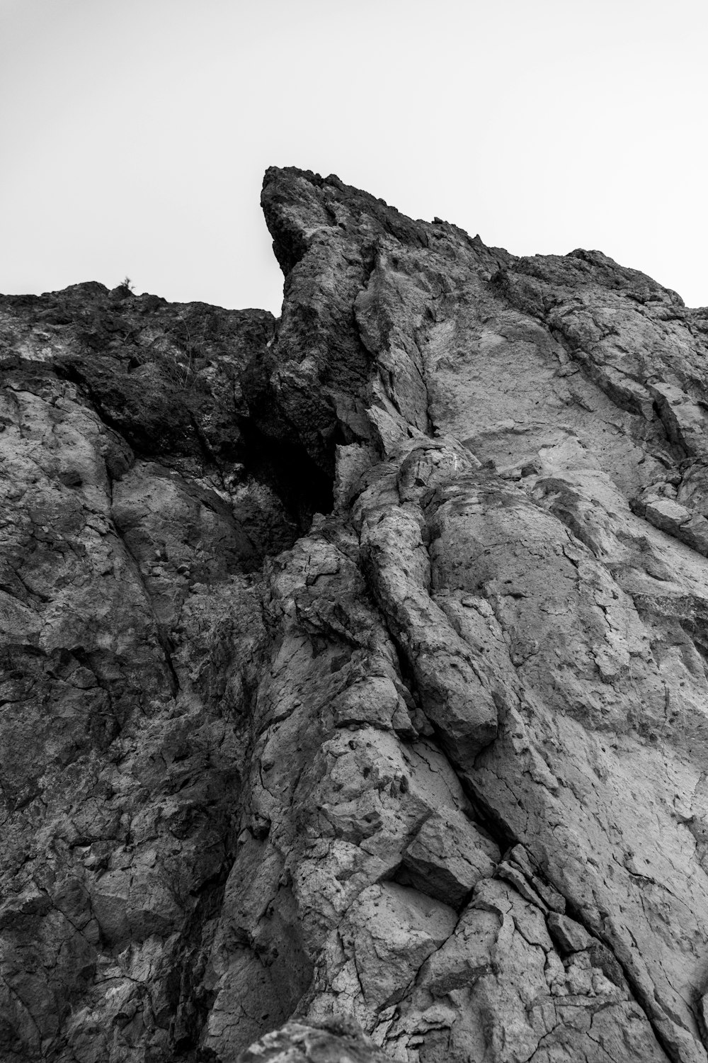 gray scale photo of rock formation