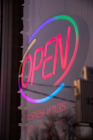 purple and white love neon light signage plomeria 24/7