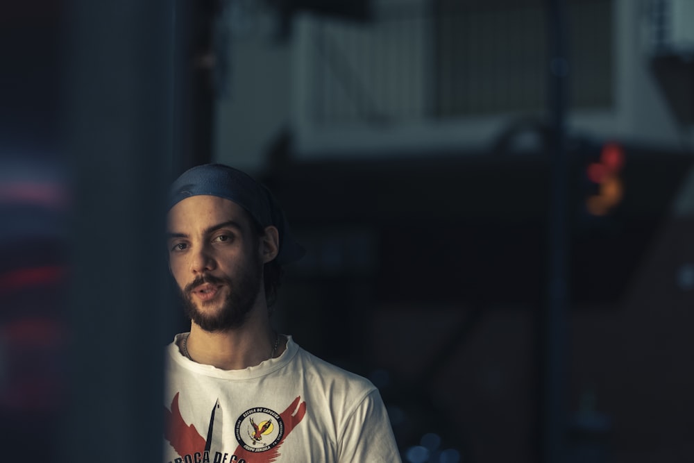 man in white and red crew neck shirt