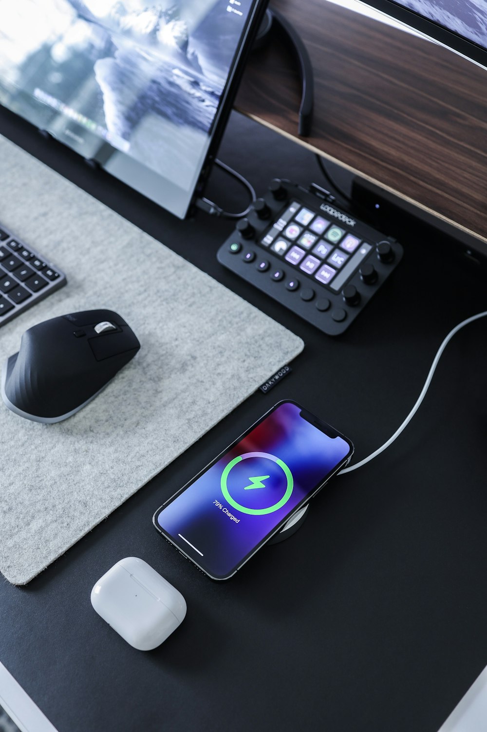 black and gray computer mouse beside black computer keyboard