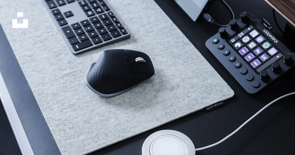 Black cordless computer mouse on gray table photo – Free Business Image ...