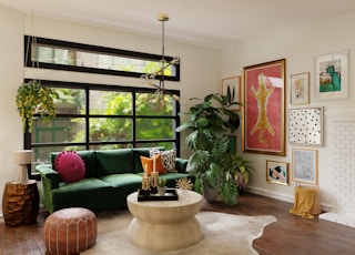 living room with green plants and brown wooden floor